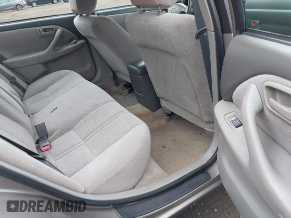 2001 Toyota Camry CE z VIN 4T1BG22K31U097733, wystawiony jako IAAI lot #42276687 z przebiegiem 180 357 mil mil oraz . Historia ofert i sprzedaży dostępna na DreamBid. Obrazek 8.