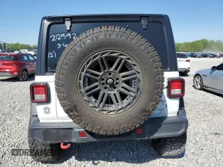 2022 Jeep Wrangler Unlimited Rubicon z VIN 1C4HJXFN2NW212592, wystawiony jako Copart lot #53071895 z przebiegiem 49 986 mil mil oraz Szkoda całkowita • Salvage title. Historia ofert i sprzedaży dostępna na DreamBid. Obrazek 6.