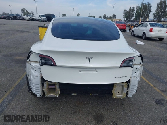 2021 Tesla Model 3 Long Range with VIN 5YJ3E1EB7MF089524, listed as a IAAI auction lot 42023474 with 19,757 mi miles and . Bid and sale history available at carsss.com. Image 6.