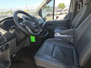 2016 Ford Transit Cargo with VIN 1FTYE1YM9GKB15650, listed as a IAAI auction lot 42679252 with 216,239 mi miles and . Bid and sale history available at DreamBid. Image 3.