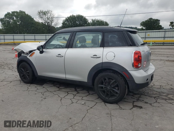 2012 MINI Countryman with VIN WMWZB3C5XCWM06778, listed as a Copart auction lot 61201285 with 64,676 mi miles and Salvage title. Bid and sale history available at DreamBid. Image 2.