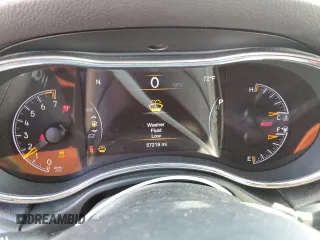 2020 Jeep Grand Cherokee Laredo E with VIN 1C4RJEAG2LC379633, listed as a Copart auction lot 58437555 with 57,219 mi miles and Salvage title. Bid and sale history available at DreamBid. Image 9.