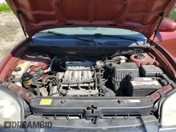 2005 Hyundai Santa Fe GLS with VIN KM8SC73D35U975899, listed as a Copart auction lot 56174615 with 182,798 mi miles and Salvage title. Bid and sale history available at DreamBid. Image 12.