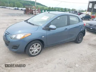 2014 Mazda 2 Sport z VIN JM1DE1KZ2E0176480, wystawiony jako IAAI lot #42268767 z przebiegiem 32 194 mil mil oraz . Historia ofert i sprzedaży dostępna na DreamBid. Obrazek 2.