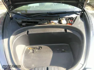 2020 Tesla Model 3 Standard Range Plus with VIN 5YJ3E1EA7LF598910, listed as a IAAI auction lot 42030288 with 95,811 mi miles. Bid and sale history available at carsss.com. Image 10.