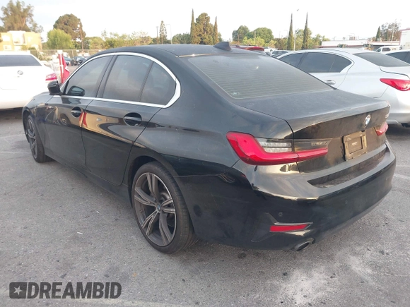 2021 BMW 3 Series 330i with VIN 3MW5R1J02M8B95303, listed as a IAAI auction lot 42184843 with 55,928 mi miles and . Bid and sale history available at carsss.com. Image 3.