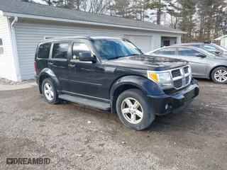 2007 Dodge Nitro SLT with VIN 1D8GU58K37W609100, listed as a IAAI auction lot 41650000 with 176,860 mi miles. Bid and sale history available at carsss.com. Image 1.