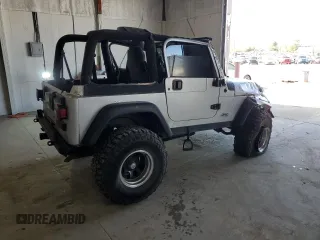 2006 Jeep Wrangler Rubicon with VIN 1J4FA69S26P734731, listed as a Copart auction lot 52009295 with 117,872 mi miles and Salvage title. Bid and sale history available at DreamBid. Image 3.