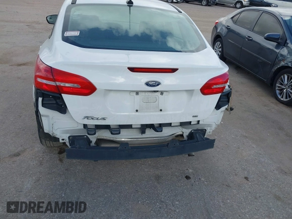 2017 Ford Focus SE with VIN 1FADP3F28HL285649, listed as a IAAI auction lot 39718289 with 118,366 mi miles and . Bid and sale history available at DreamBid. Image 6.