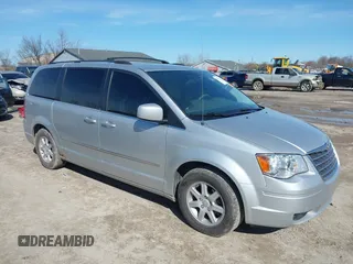 2010 Chrysler Town & Country Touring with VIN 2A4RR5D19AR450132, listed as a IAAI auction lot 41951121 with 283,451 mi miles. Bid and sale history available at carsss.com. Image 1.
