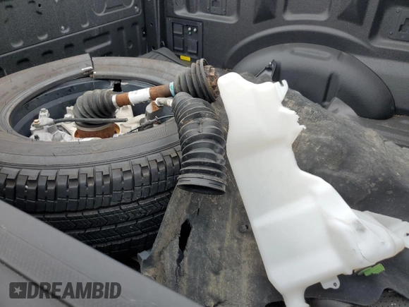 2023 Ford F-150 Lightning Pro z VIN 1FTVW1ELXPWG63466, wystawiony jako Copart lot #59163895 z przebiegiem Nie podano mil oraz Szkody całkowita. Historia ofert i sprzedaży dostępna na DreamBid. Obrazek 12.