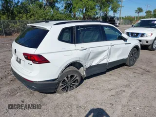 2022 Volkswagen Tiguan S with VIN 3VV0B7AX1NM099058, listed as a IAAI auction lot 41771674 with 49,789 mi miles. Bid and sale history available at carsss.com. Image 4.