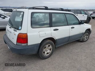 1998 Subaru Forester L with VIN JF1SF635XWH753021, listed as a IAAI auction lot 41541975 with 236,425 mi miles. Bid and sale history available at carsss.com. Image 4.