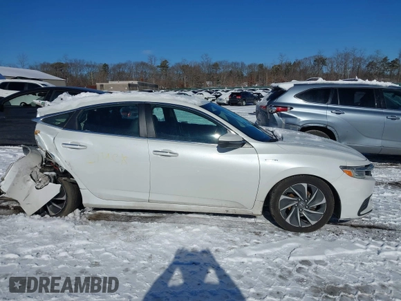 2022 Honda Insight Touring with VIN 19XZE4F99NE017352, listed as a IAAI auction lot 41355664 with 97,865 mi miles and . Bid and sale history available at DreamBid. Image 14.