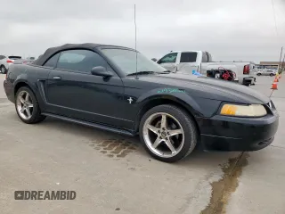 2000 Ford Mustang with VIN 1FAFP444XYF251973, listed as a Copart auction lot 58192815 with 114,531 mi miles and Salvage title. Bid and sale history available at DreamBid. Image 4.