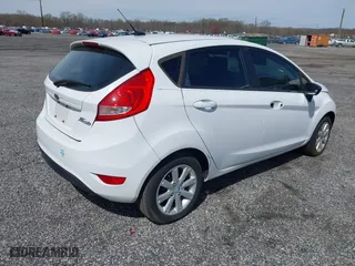 2011 Ford Fiesta SE with VIN 3FADP4EJ3BM231633, listed as a IAAI auction lot 41915946 with 130,891 mi miles. Bid and sale history available at carsss.com. Image 4.