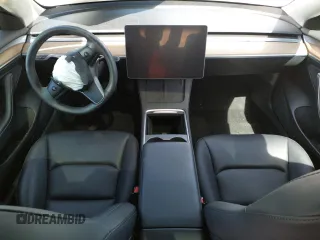 2023 Tesla Model 3 with VIN 5YJ3E1EA6PF423070, listed as a Copart auction lot 52029985 with 19,541 mi miles and Salvage Title. Bid and sale history available at DreamBid. Image 8.