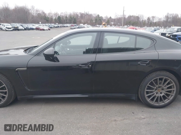2016 Porsche Panamera 4 z VIN WP0AA2A72GL005752, wystawiony jako IAAI lot #41869840 z przebiegiem 114 719 mil mil oraz . Historia ofert i sprzedaży dostępna na DreamBid. Obrazek 14.
