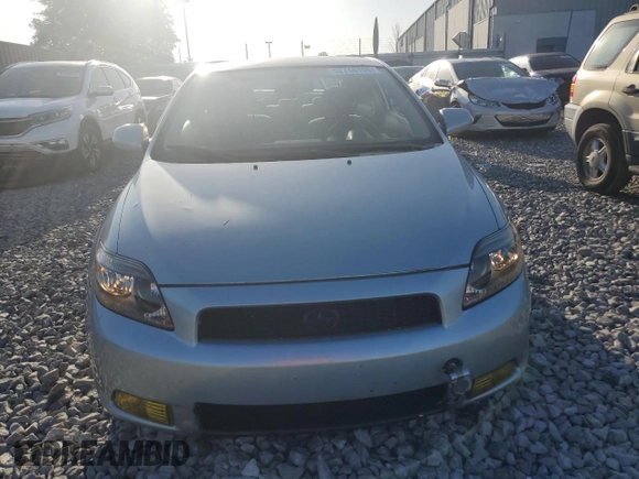 2006 Scion tC z VIN JTKDE177060137498, wystawiony jako Copart lot #52748195 z przebiegiem 194 151 mil mil oraz Szkoda całkowita • Salvage title. Historia ofert i sprzedaży dostępna na DreamBid. Obrazek 5.
