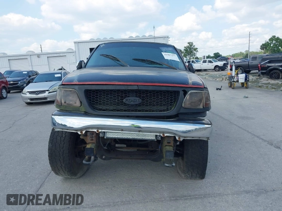 2003 Ford F-150 XLT z VIN 1FTRW08L73KA58913, wystawiony jako IAAI lot #41907277 z przebiegiem 147 294 mil mil oraz . Historia ofert i sprzedaży dostępna na DreamBid. Obrazek 12.