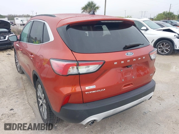 2020 Ford Escape Titanium Hybrid with VIN 1FMCU0DZ1LUB13684, listed as a IAAI auction lot 41629782 with 31,669 mi miles and . Bid and sale history available at DreamBid. Image 3.