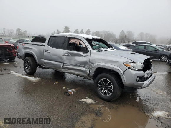2021 Toyota Tacoma 4WD SR5 with VIN 3TMDZ5BN7MM105408, listed as a Copart auction lot 45128645 with 0 mi miles and Salvage Title. Bid and sale history available at carsss.com. Image 4.