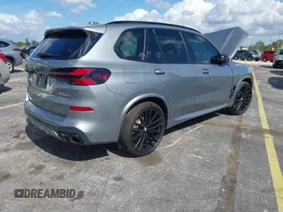 2025 BMW X5 M60i with VIN 5UX33EU03S9X62019, listed as a IAAI auction lot 41623189 with 5,749 mi miles. Bid and sale history available at carsss.com. Image 4.