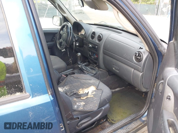 2003 Jeep Liberty Sport with VIN 1J4GL48K23W685486, listed as a IAAI auction lot 42094185 with 156,690 mi miles. Bid and sale history available at carsss.com. Image 5.