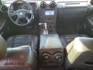 2005 Hummer H2 SUT with VIN 5GRGN22U85H109003, listed as a Copart auction lot 76557734 with 115,249 mi miles and Salvage Title. Bid and sale history available at carsss.com. Image 8.