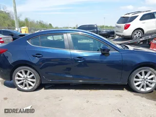 2017 Mazda Mazda3 4-Door Touring with VIN 3MZBN1V74HM114577, listed as a IAAI auction lot 41846720 with 139,009 mi miles. Bid and sale history available at carsss.com. Image 13.