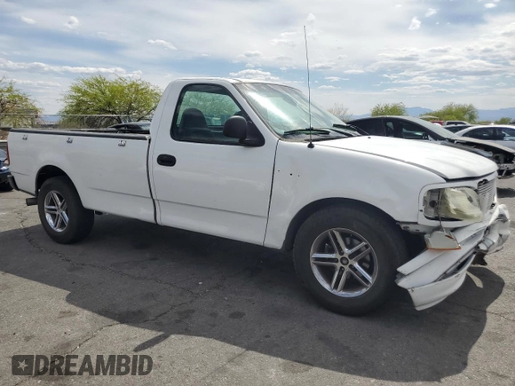 2004 Ford F-150 XL with VIN 2FTRF17294CA59985, listed as a Copart auction lot 55296195 with 220,933 mi miles and Salvage title. Bid and sale history available at DreamBid. Image 4.