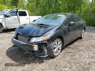 2012 Honda Civic Si with VIN 2HGFB6E54CH200229, listed as a Copart auction lot 60042695 with 141,190 mi miles and Salvage title. Bid and sale history available at DreamBid. Image 1.