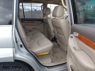 2004 Lexus GX 470 with VIN JTJBT20X140038154, listed as a IAAI auction lot 42034484 with 176,440 mi miles. Bid and sale history available at carsss.com. Image 8.