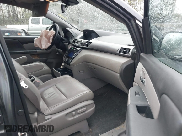 2014 Honda Odyssey EX-L with VIN 5FNRL5H63EB033684, listed as a IAAI auction lot 42025249 with 128,017 mi miles and . Bid and sale history available at carsss.com. Image 5.