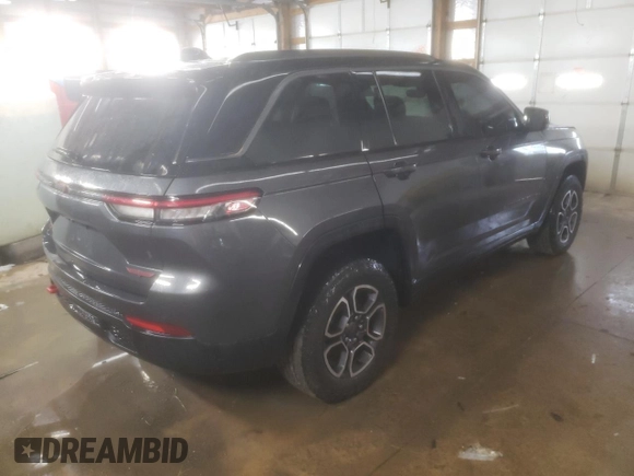 2022 Jeep Grand Cherokee Trailhawk with VIN 1C4RJHCG8N8572275, listed as a Copart auction lot 85665194 with 15,692 mi miles and Salvage title. Bid and sale history available at DreamBid. Image 3.