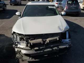 2023 Honda Civic Touring z VIN 2HGFE1F95PH314838, wystawiony jako Copart lot #52545085 z przebiegiem 29 863 mil mil oraz Szkoda całkowita • Salvage title. Historia ofert i sprzedaży dostępna na DreamBid. Obrazek 5.