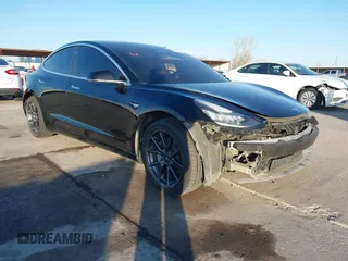 2019 Tesla Model 3 Mid Range with VIN 5YJ3E1EAXKF344817, listed as a IAAI auction lot 41828946 with 86,007 mi miles and . Bid and sale history available at DreamBid. Image 1.