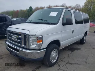 2014 Ford Econoline Passenger XL with VIN 1FBNE3BL4EDA97935, listed as a IAAI auction lot 42187031 with 228,696 mi miles. Bid and sale history available at carsss.com. Image 2.