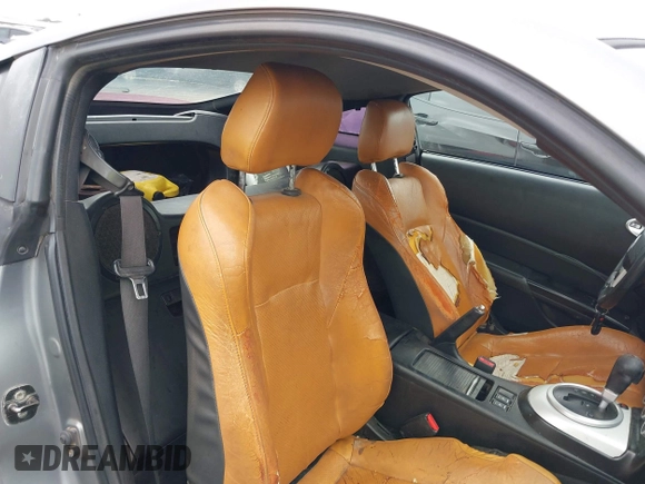 2006 Nissan 350Z Touring z VIN JN1AZ34D86M312841, wystawiony jako IAAI lot #42336869 z przebiegiem 138 191 mil mil oraz . Historia ofert i sprzedaży dostępna na DreamBid. Obrazek 8.