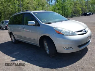 2010 Toyota Sienna XLE with VIN 5TDYK4CC3AS316002, listed as a IAAI auction lot 42138246 with 123,203 mi miles. Bid and sale history available at carsss.com. Image 1.