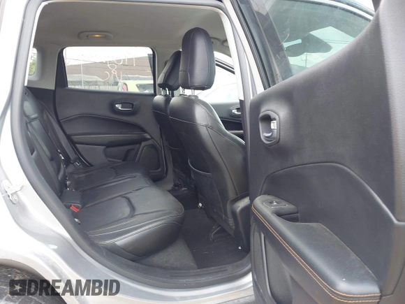 2018 Jeep Compass Limited with VIN 3C4NJDCB9JT267021, listed as a IAAI auction lot 42270830 with 82,437 mi miles and . Bid and sale history available at DreamBid. Image 8.