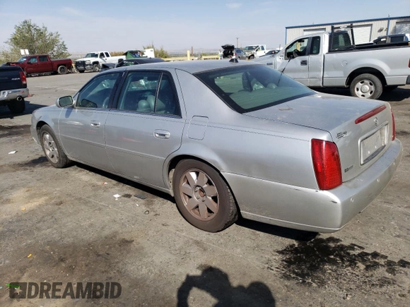 2004 Cadillac DeVille DTS z VIN 1G6KF57994U203706, wystawiony jako Copart lot #76278324 z przebiegiem 203 709 mil mil oraz Szkoda całkowita • Salvage title. Historia ofert i sprzedaży dostępna na DreamBid. Obrazek 2.