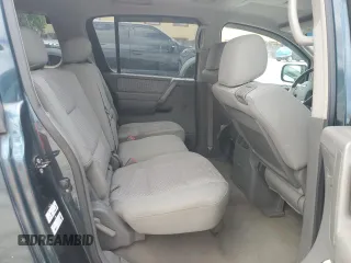 2006 Nissan Armada LE z VIN 5N1AA08A66N704984, wystawiony jako Copart lot #53643095 z przebiegiem 217 337 mil mil oraz Szkoda całkowita • Salvage title. Historia ofert i sprzedaży dostępna na DreamBid. Obrazek 11.