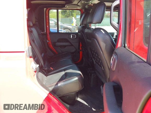 2023 Jeep Gladiator Rubicon z VIN 1C6JJTBG2PL509200, wystawiony jako IAAI lot #42537312 z przebiegiem Nie podano mil oraz . Historia ofert i sprzedaży dostępna na DreamBid. Obrazek 7.