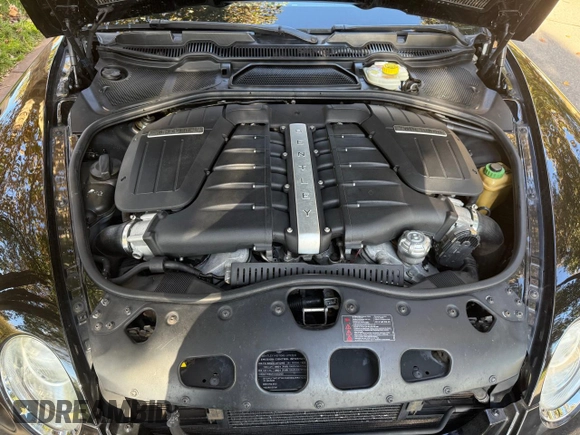 2011 Bentley Continental GT with VIN SCBDP3ZA4BC067912, listed as a Copart auction lot 82473194 with 64,397 mi miles and Clean Title. Bid and sale history available at DreamBid. Image 7.