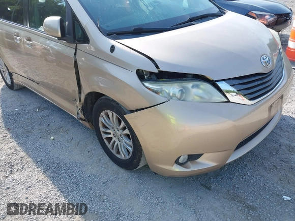 2011 Toyota Sienna XLE AAS with VIN 5TDYK3DC7BS008535, listed as a IAAI auction lot 42589645 with 208,624 mi miles and . Bid and sale history available at DreamBid. Image 6.