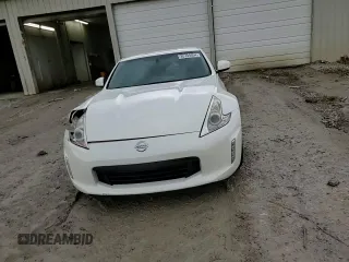 2013 Nissan 370Z Touring z VIN JN1AZ4EH5DM383466, wystawiony jako Copart lot #85704054 z przebiegiem 37 892 mil mil oraz Szkoda całkowita • Salvage title. Historia ofert i sprzedaży dostępna na DreamBid. Obrazek 13.