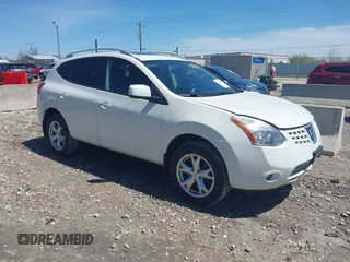 2009 Nissan Rogue S with VIN JN8AS58V29W440702, listed as a IAAI auction lot 42158143 with 311,180 mi miles. Bid and sale history available at carsss.com. Image 1.