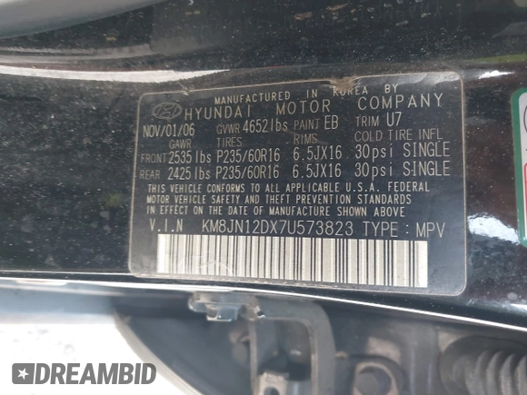 2007 Hyundai Tucson SE with VIN KM8JN12DX7U573823, listed as a IAAI auction lot 41238550 with 79,641 mi miles. Bid and sale history available at carsss.com. Image 9.