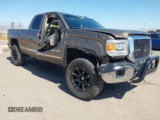 2014 GMC Sierra 1500 SLT with VIN 1GTV2VEC1EZ260667, listed as a IAAI auction lot 42202453 with 120,406 mi miles and . Bid and sale history available at DreamBid. Image 1.